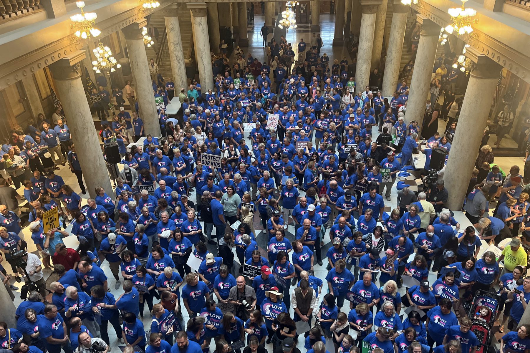 anti-abortion advocates in blue at the Indiana Capitol