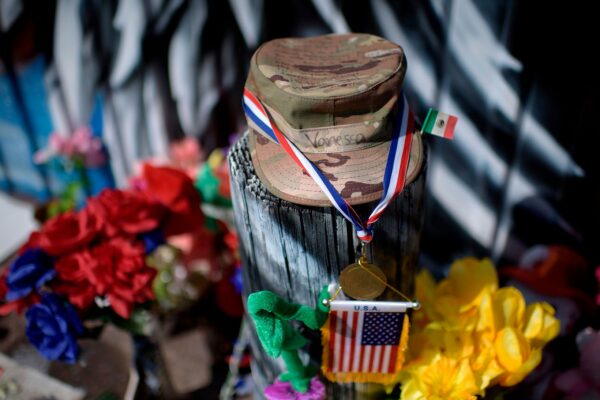 Candles and flowers decorate a makeshift memorial for U.S. Army Specialist Vanessa Guillen.