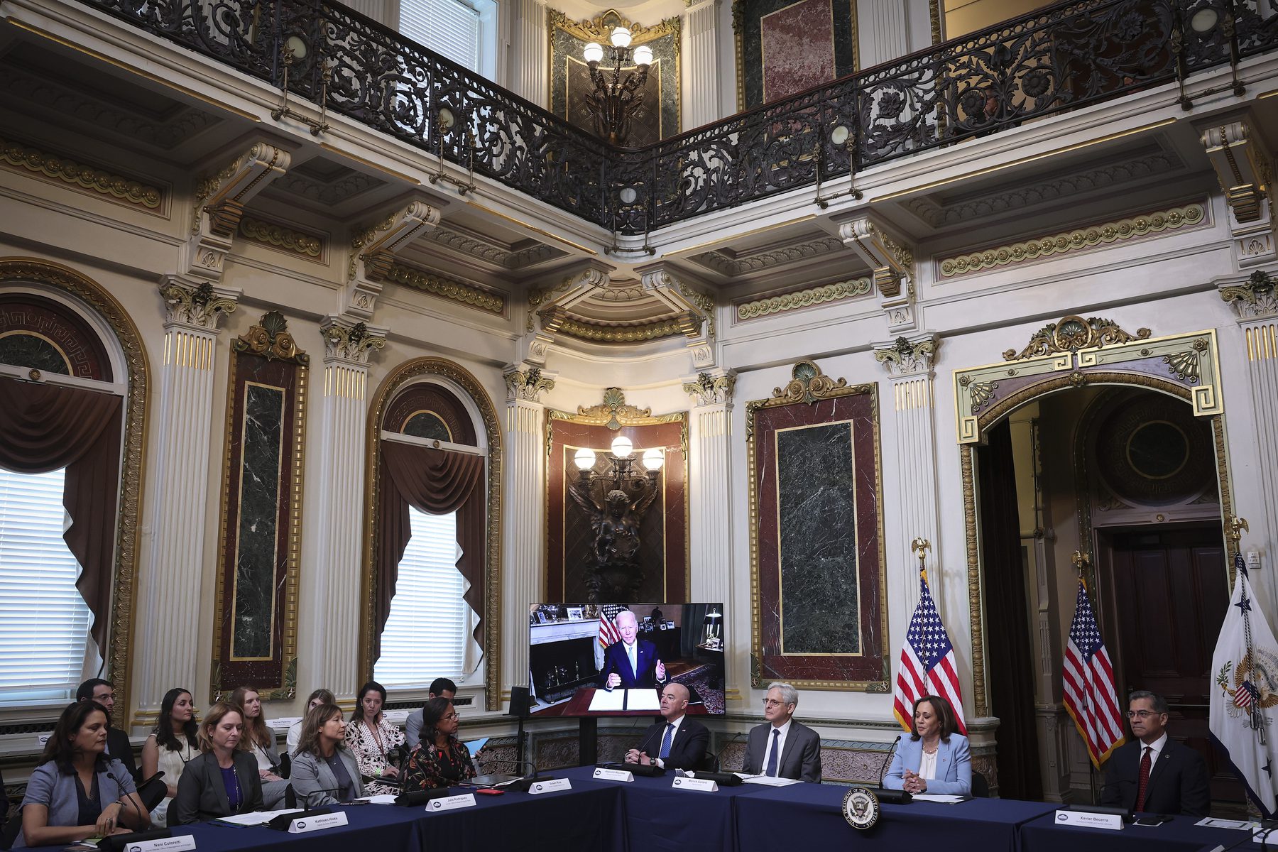 Members of a task force on reproductive rights sit together for a meeting at The White House.