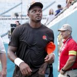 Quarterback Deshaun Watson #4 of the Cleveland Browns talk with fans before the start of a preseason game against the Jacksonville Jaguars at TIAA Bank Field on August 12, 2022 in Jacksonville, Florida.