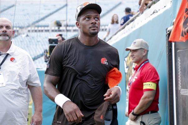 Quarterback Deshaun Watson #4 of the Cleveland Browns talk with fans before the start of a preseason game against the Jacksonville Jaguars at TIAA Bank Field on August 12, 2022 in Jacksonville, Florida.