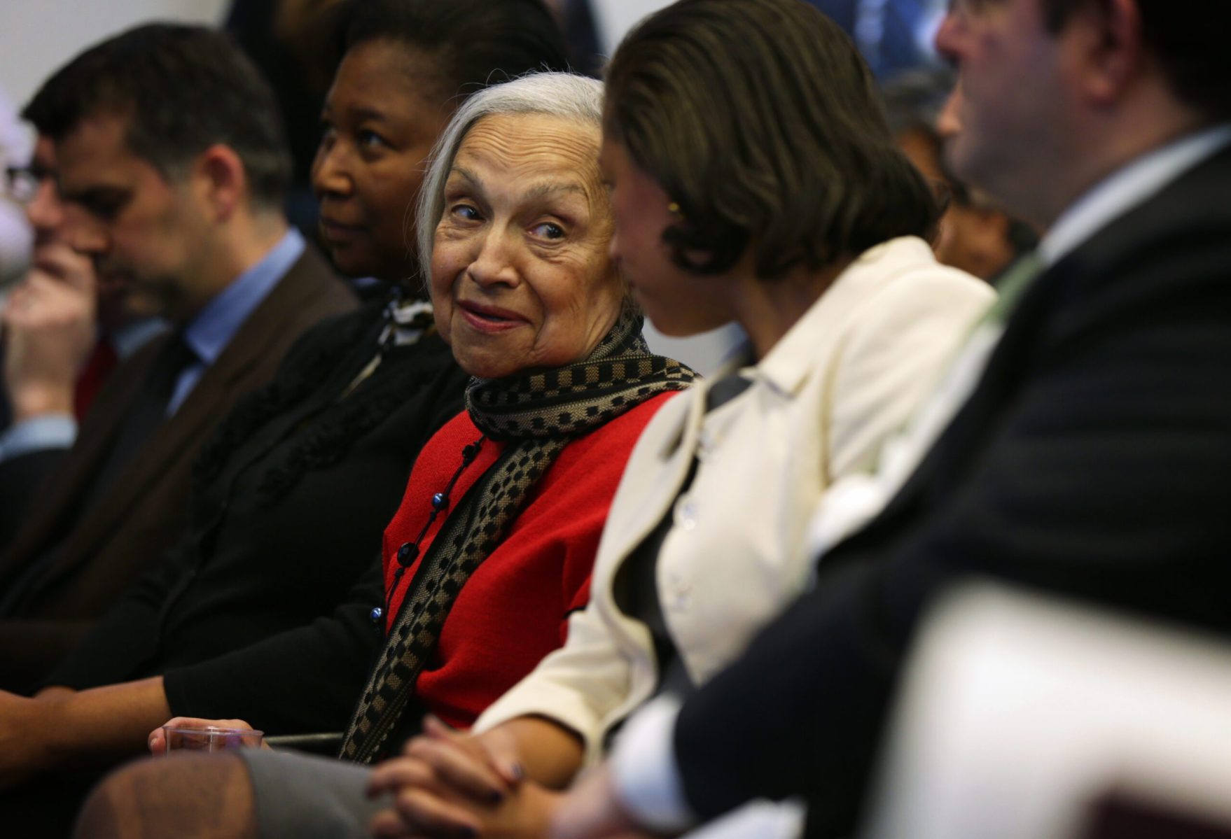 Lois Dickson Rice, center, in red, with her daughter, National Security Adviser Susan Rice