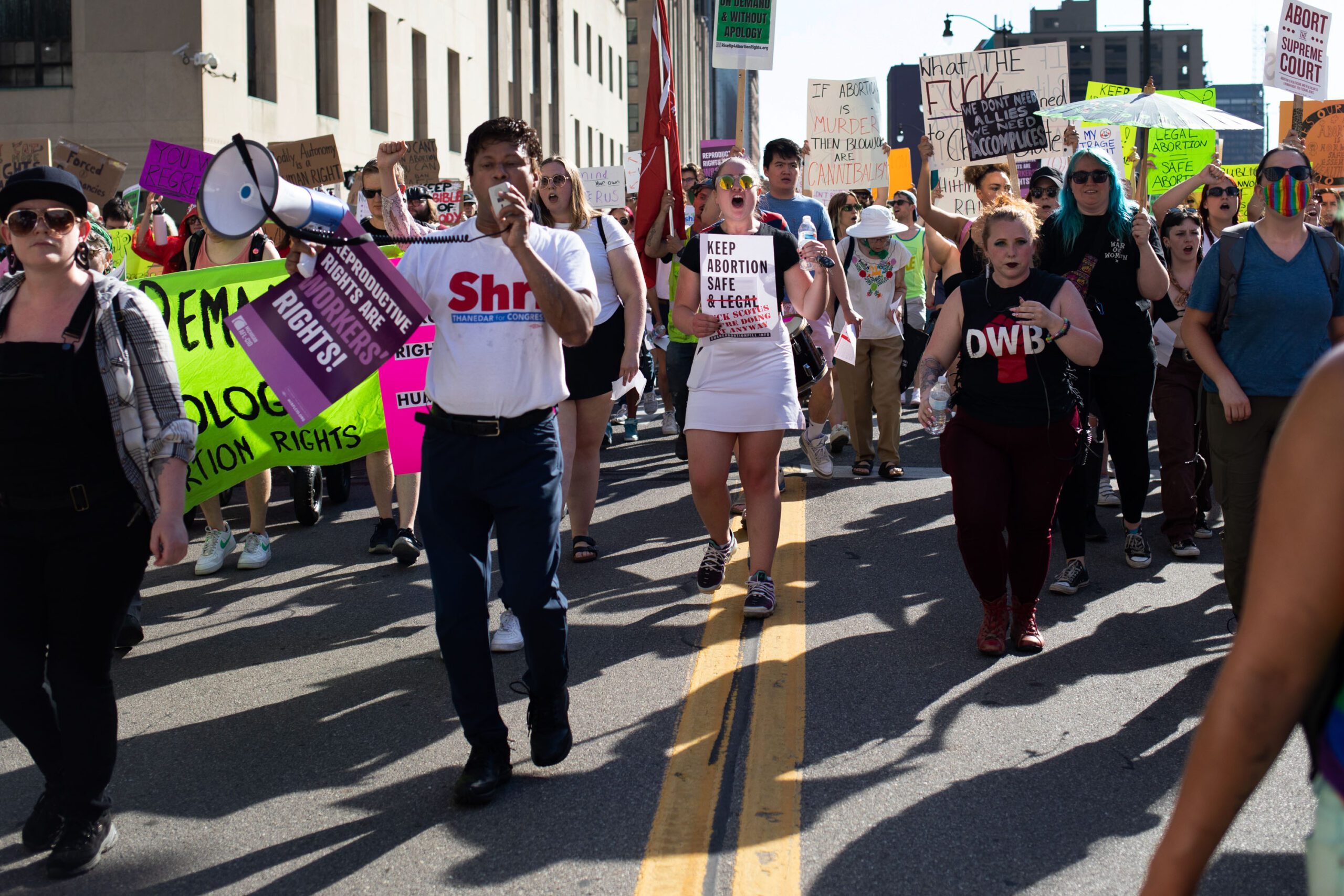 Abortion rights demonstrators march through the streets of Detroit.
