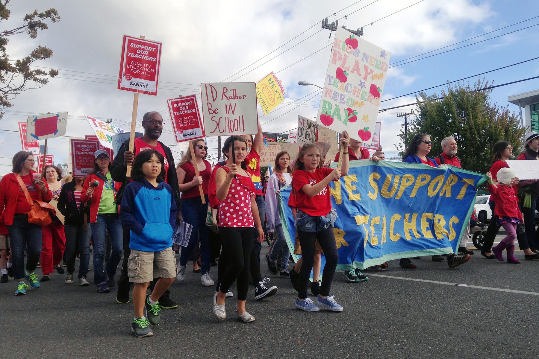 Supporters of striking Seattle teachers take part in a march in downtown Seattle.