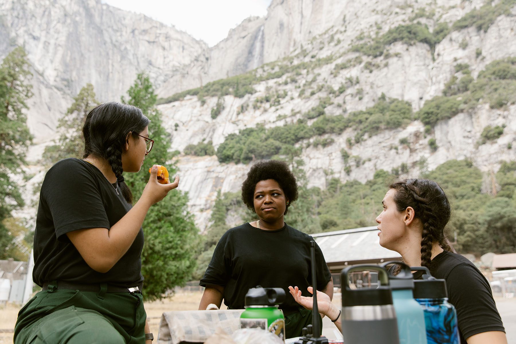 Marlene Chavez, Tricia Andrews and Guadalupe Ruiz trade stories about past wildland fire experiences during their lunch break.