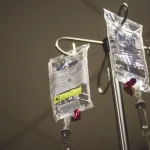 Chemotherapy drugs on a hospital pole.
