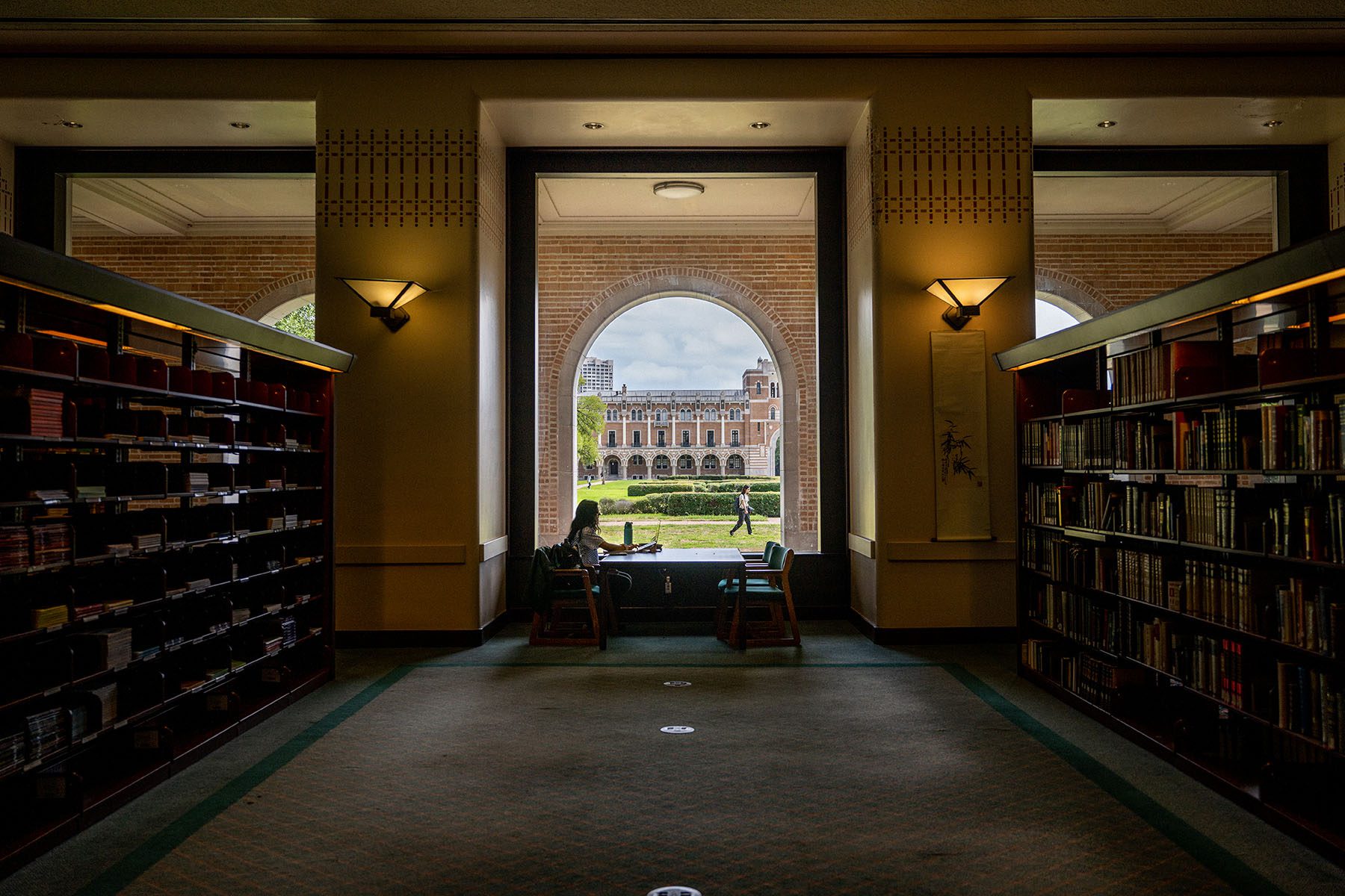 A student works at the Rice University Library in Houston, Texas.