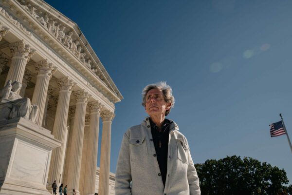 Edward Blum tands for a portrait in front of the U.S. Supreme Court.