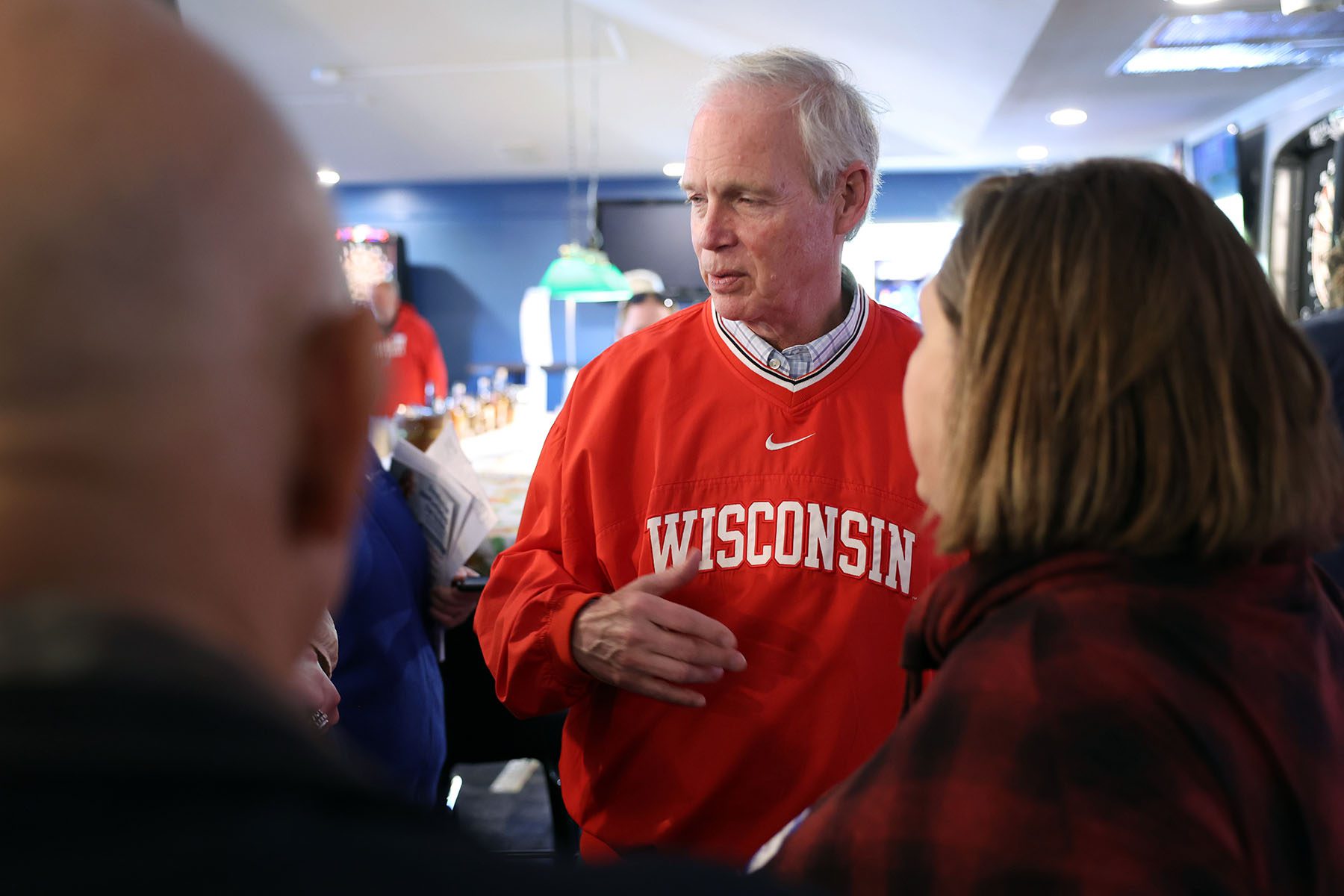 Sen. Ron Johnson greets guests during a campaign stop at the Moose Lodge Octoberfest celebration.