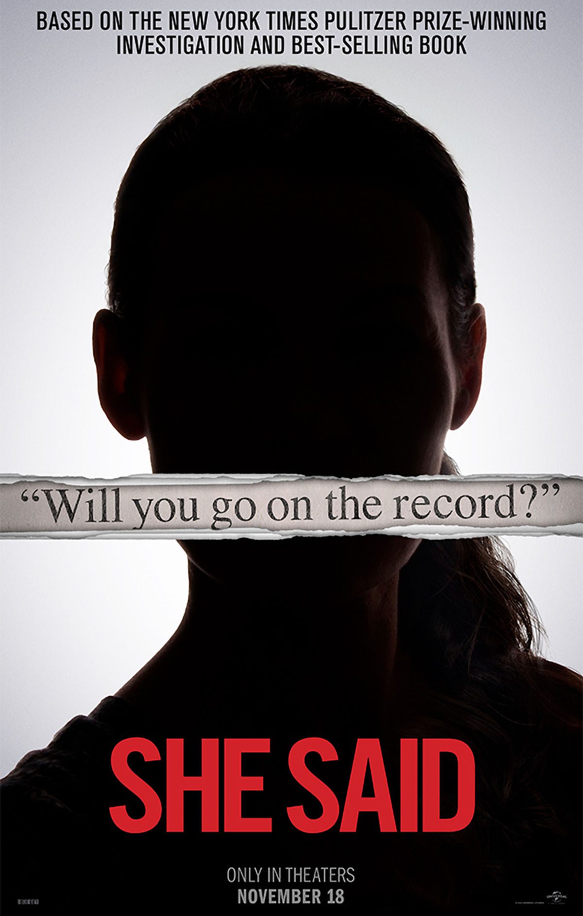 Movie poster for "she said" shows a dark figure and reads "will you go on the record?"