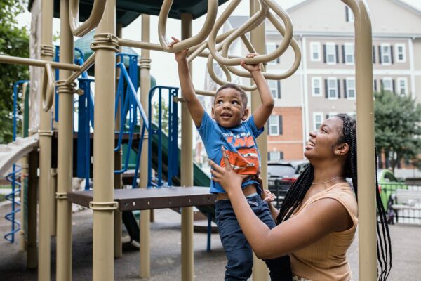 Sarah Turner and her son, Noah, play together at a park.