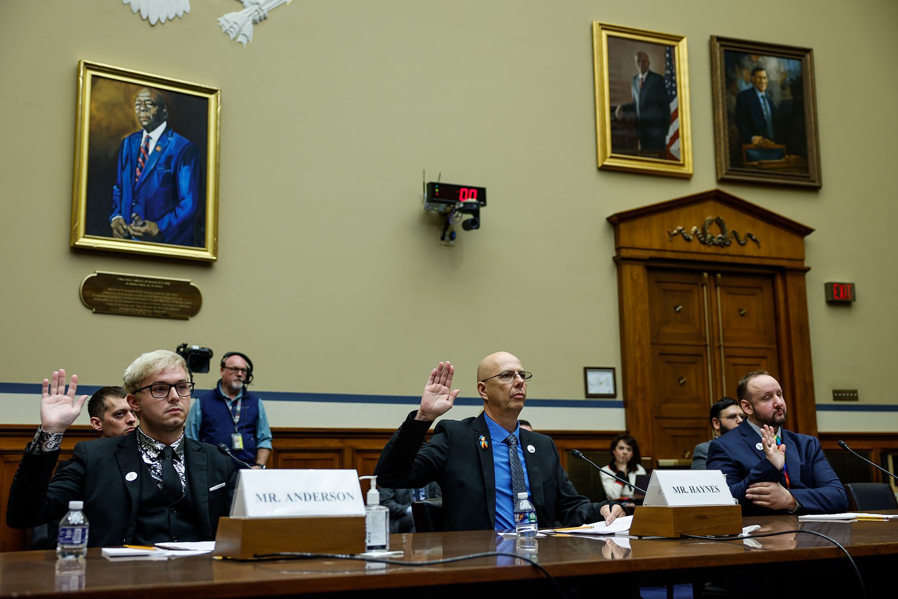 Michael Anderson, Matthew Haynes and James Slaugh are sworn in during a House Oversight Committee hearing on Capitol Hill.