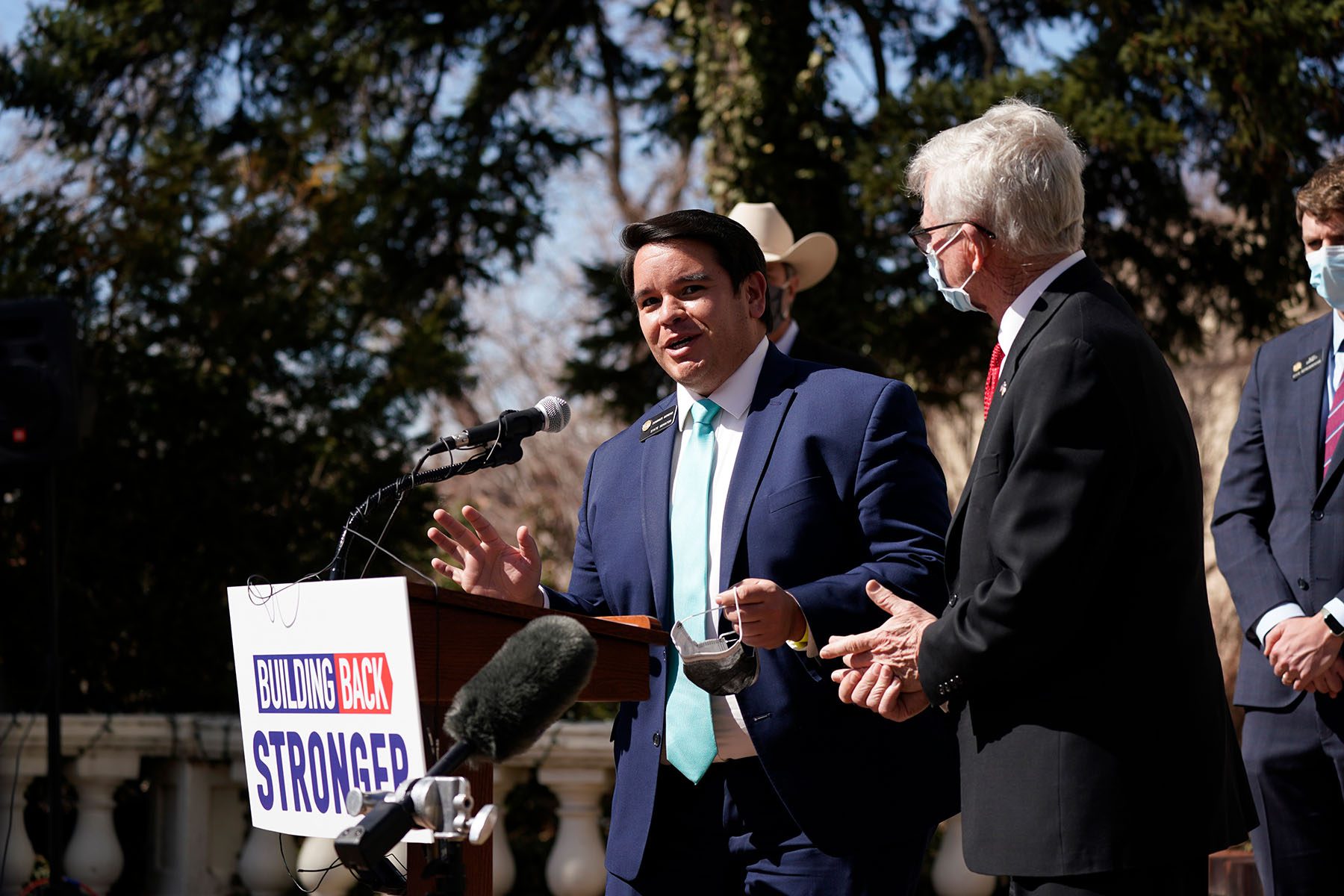 Dominick Moreno speaks during a news conference outside the Colorado Governor's mansion.