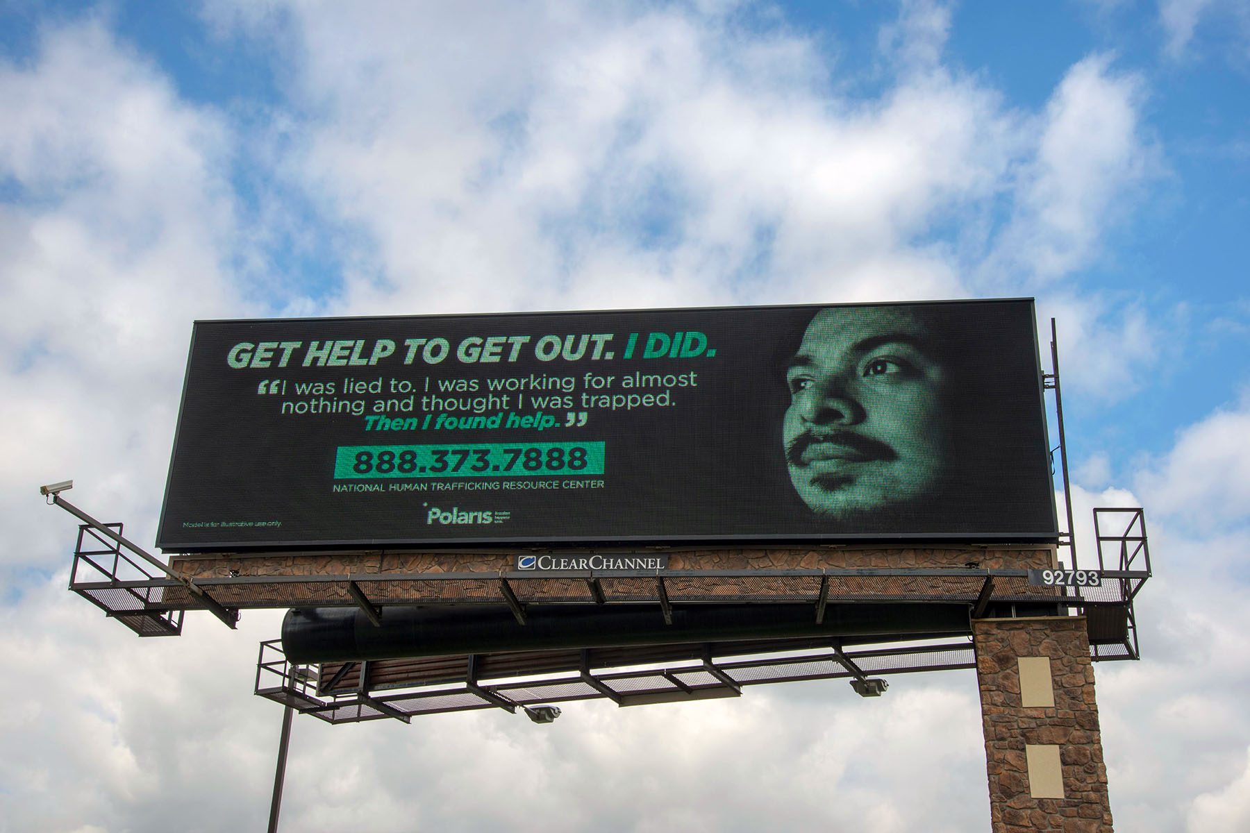 An anti-trafficking billboard reads 