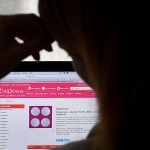 A person researches abortion pills on the internet.