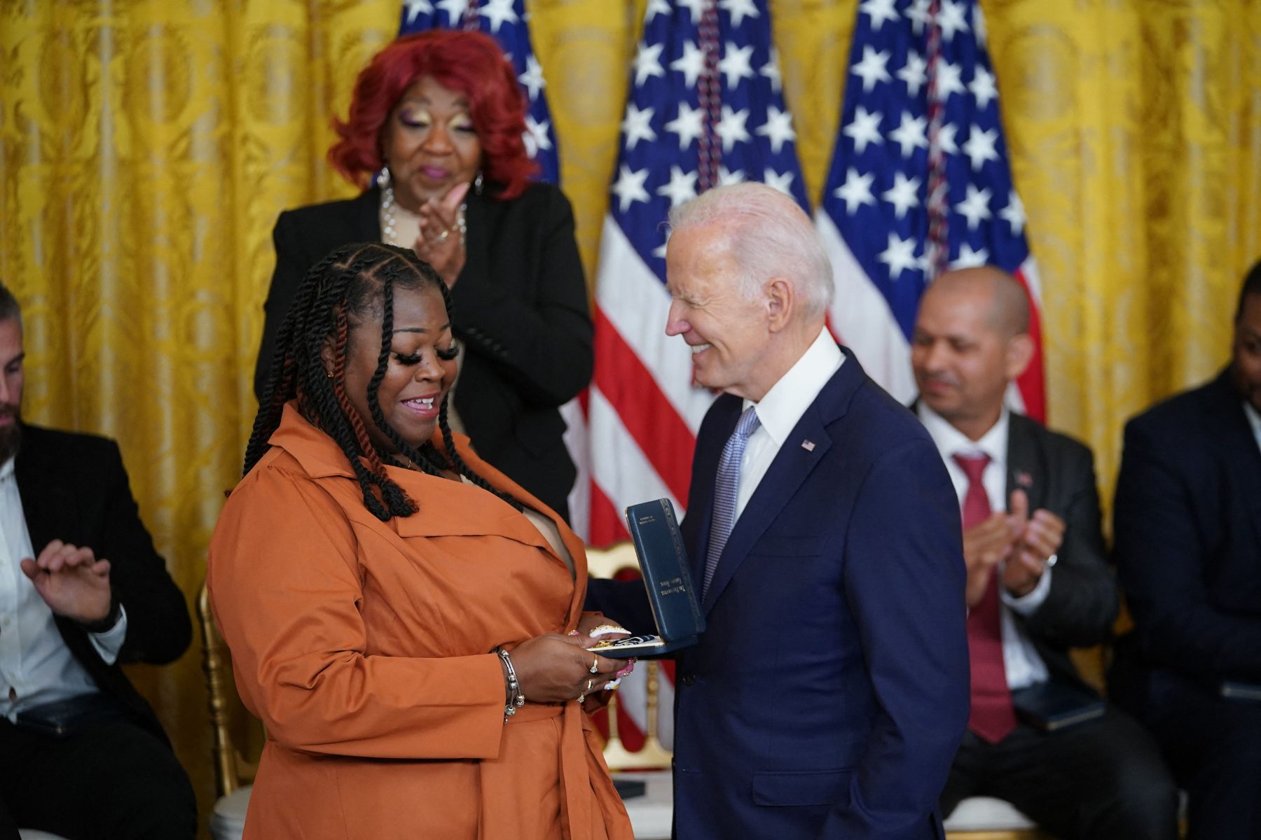 Shaye Moss, election worker from Fulton County, Ga., receives the President Citizens Medal from President Joe Biden for her work upholding the 2020 presidential election