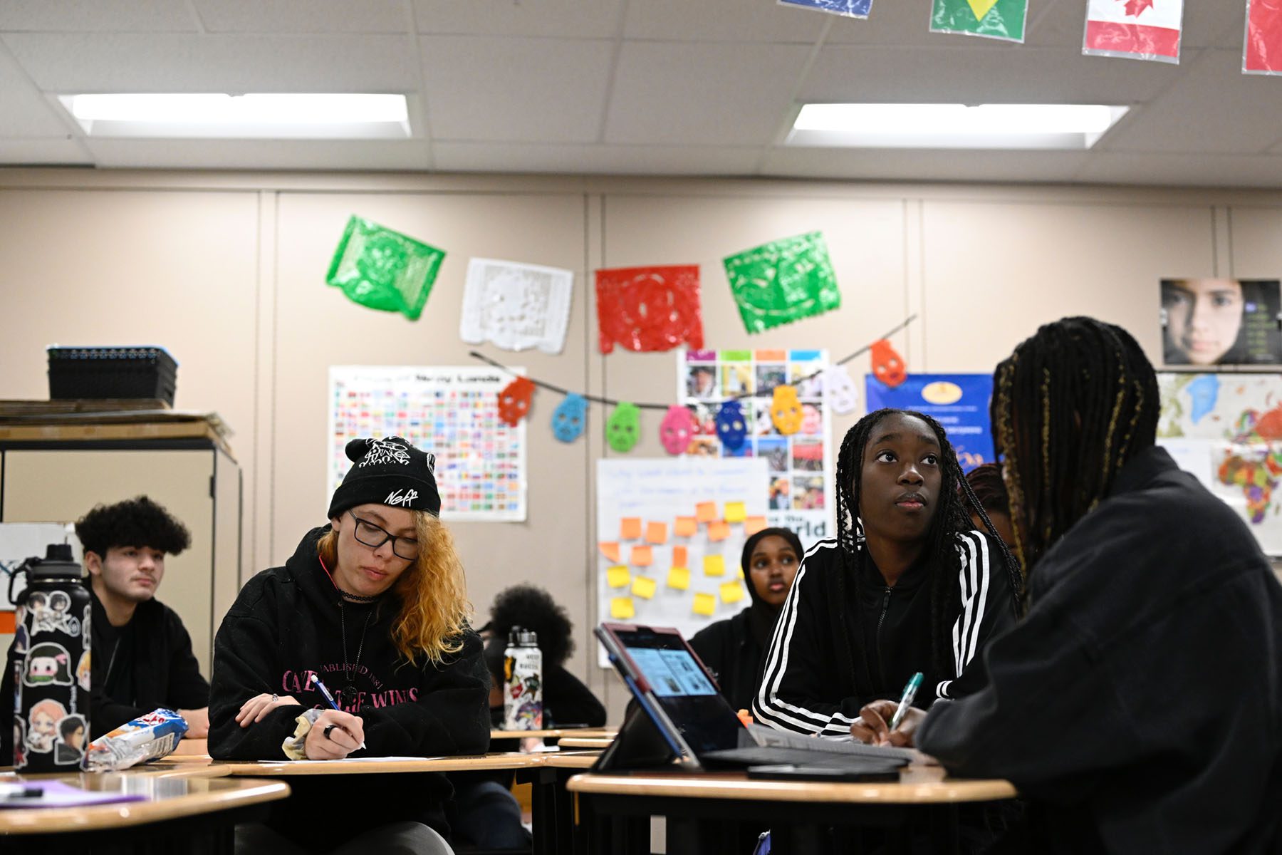 Students take notes during an AP African-American Studies class.