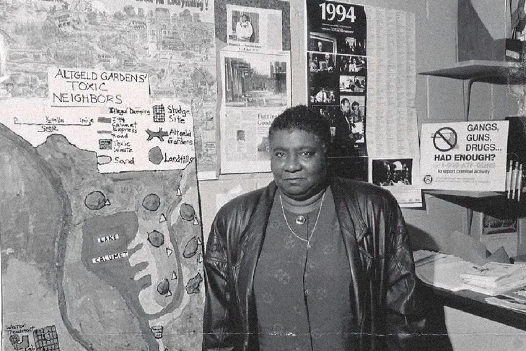 Hazel M. Johnson stands next to a map of Altgeld Gardens in Chicago, Illinois circa 1995.