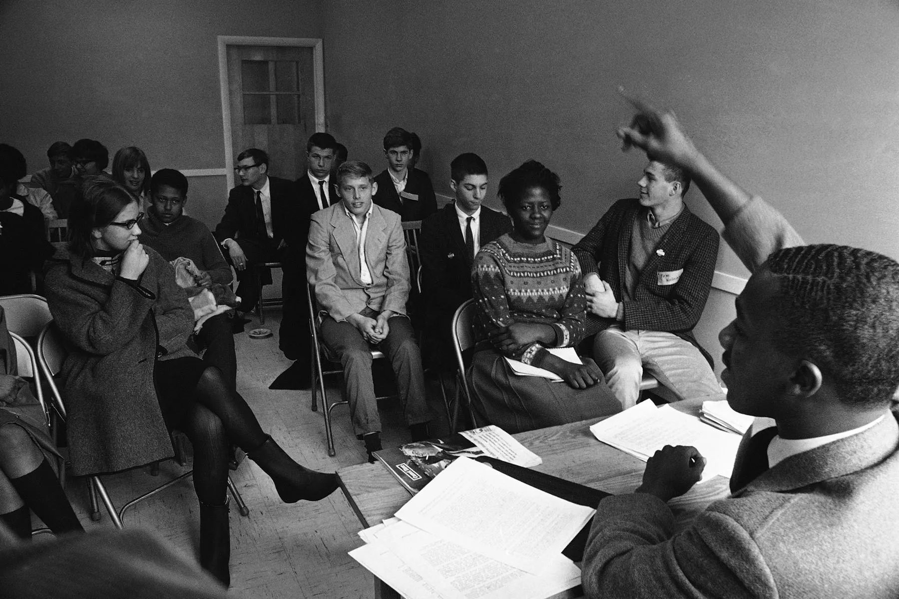 Leon Waithe leads a Freedom School class meeting at Tremont Street Methodist Church in Boston. Both white and black students are present in the classroom.