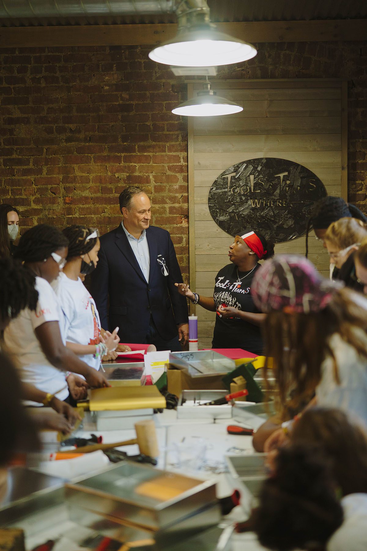 Judaline Cassidy chats with first gentleman Doug Emhoff as he visits Tools & Tiaras.