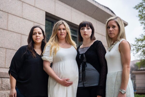 Anna Zaragarian, Lauren Miller, Lauren Hall and Amanda Zurawski pose for a portrait near the Texas State Capitol.