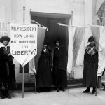 A group of suffragists, including Alice Paul, picket outside the Metropolitan Opera House in New York City in 1919.