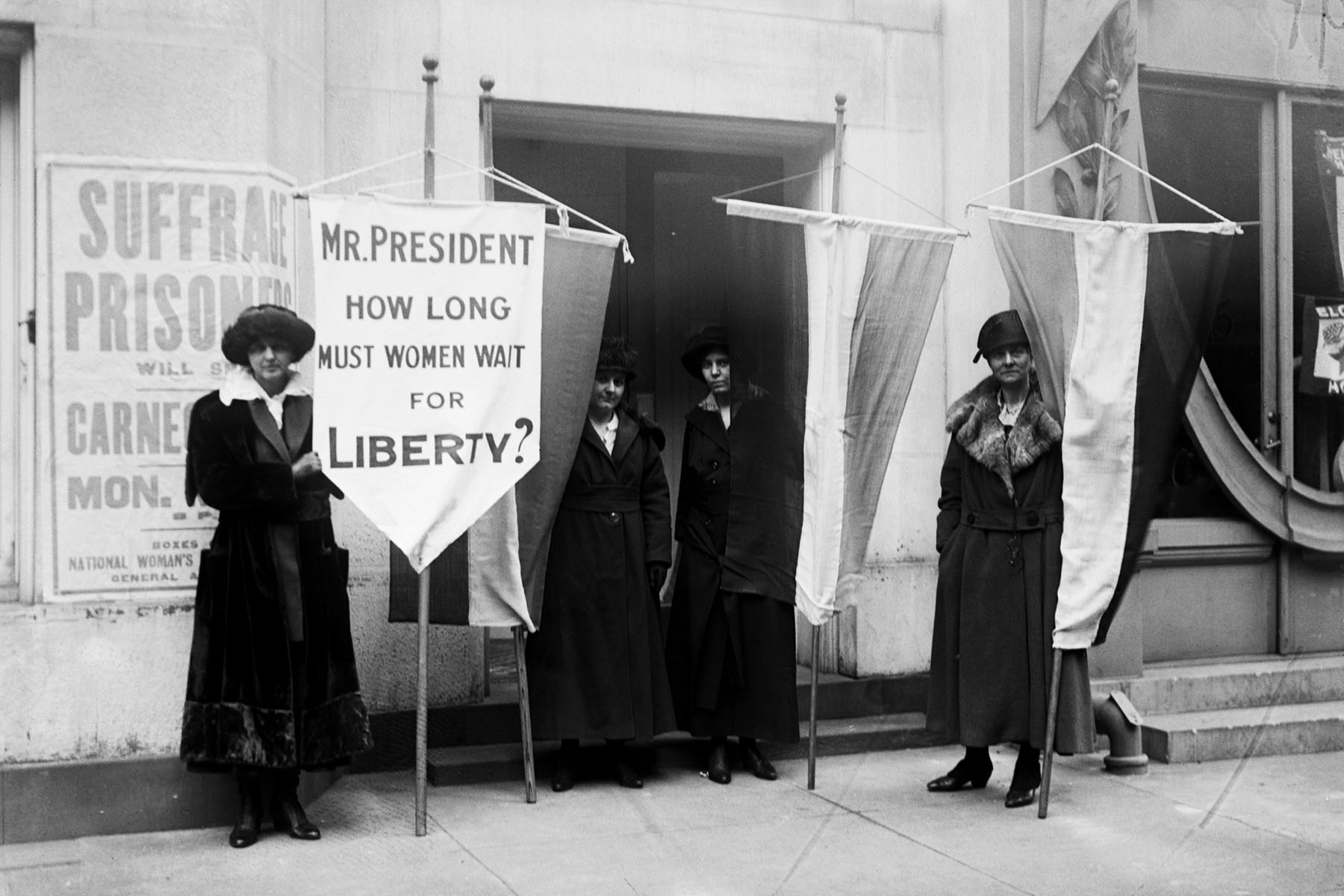 A group of suffragists, including Alice Paul, picket outside the Metropolitan Opera House in New York City in 1919.
