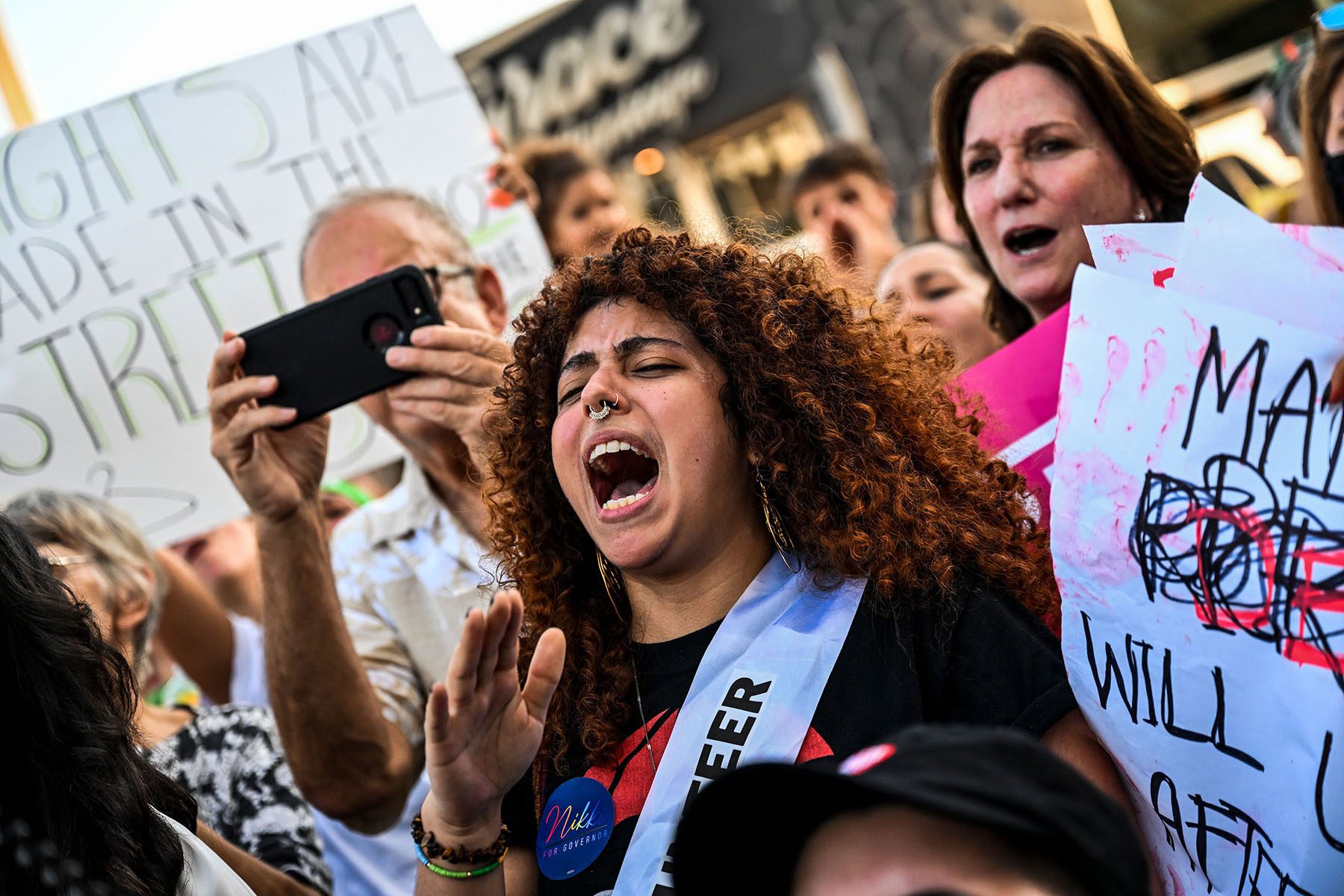 Abortion rights activists shout slogans as they rally in Miami, Florida.