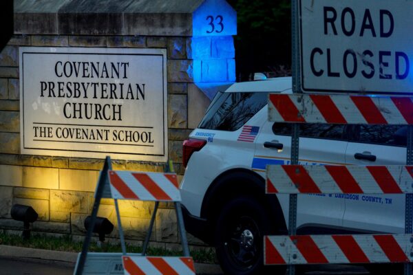 A Nashville police car blocks the entrance of the Covenant School in Nashville.