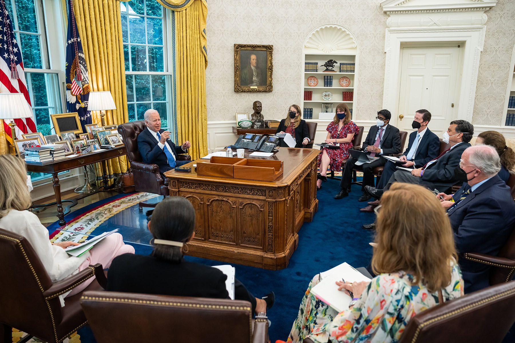 President Biden, joined by senior advisers, reviews remarks on the Supreme Court decision on Dobbs v. Jackson Women’s Health Organization in the Oval Office.