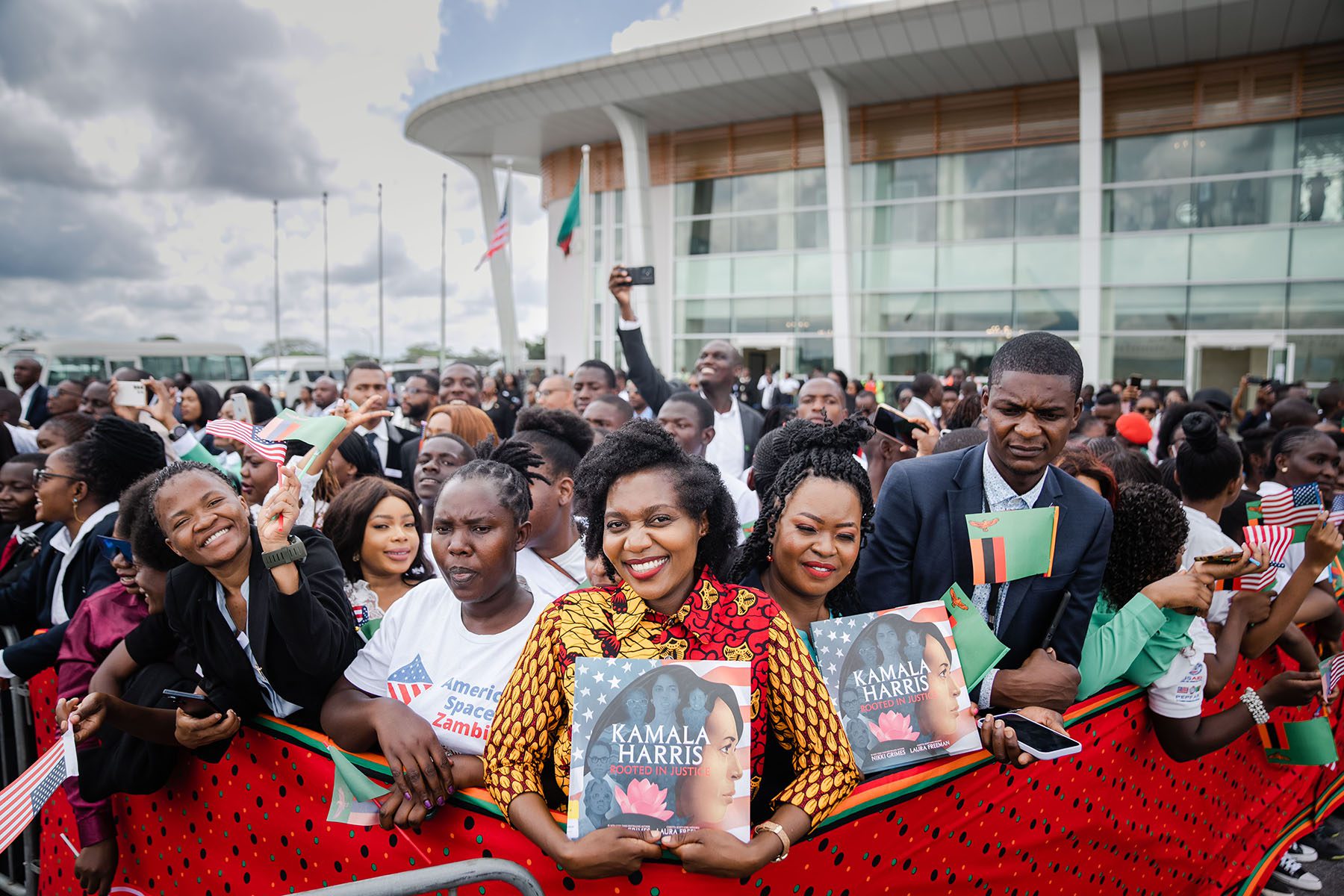 Well wishers await the arrival of Vice President Kamala Harris and Second Gentleman Doug Emhoff at Kenneth Kuanda International Airport.