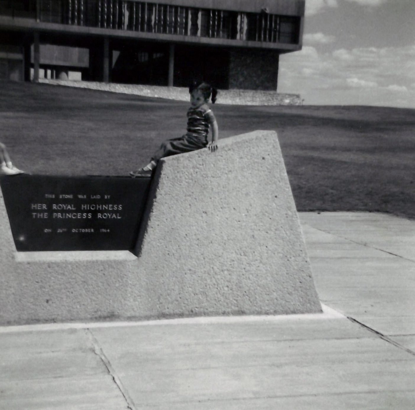 Kamala Harris poses near the National Assembly of Zambia as a child.