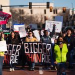 People march through downtown Amarillo, Texas to protest a lawsuit to ban the abortion drug mifepristone.