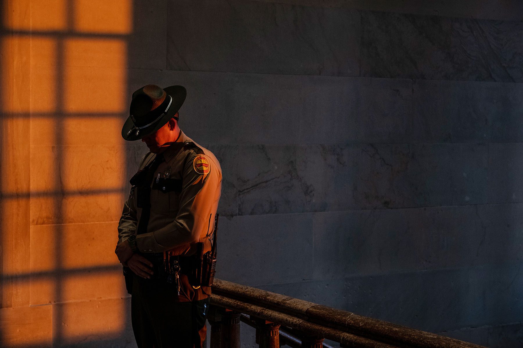 A Tennessee state trooper stands watch inside the Capitol building during a House session.