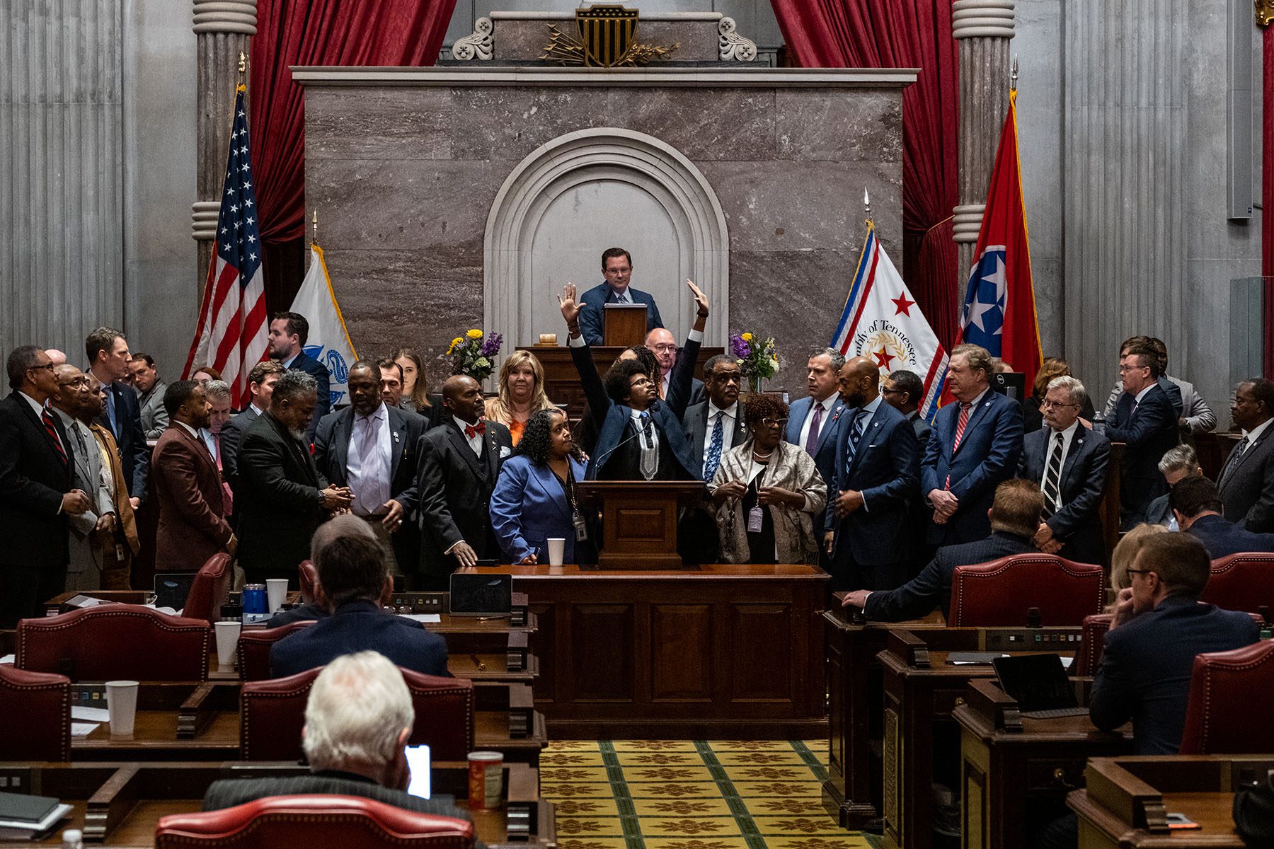 Rep. Justin Pearson of Memphis acknowledges supporters after being expelled from the state Legislature in the Tennessee State Capitol chambers.