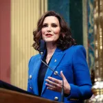 Michigan Gov. Gretchen Whitmer delivers her State of the State address at the state Capitol.