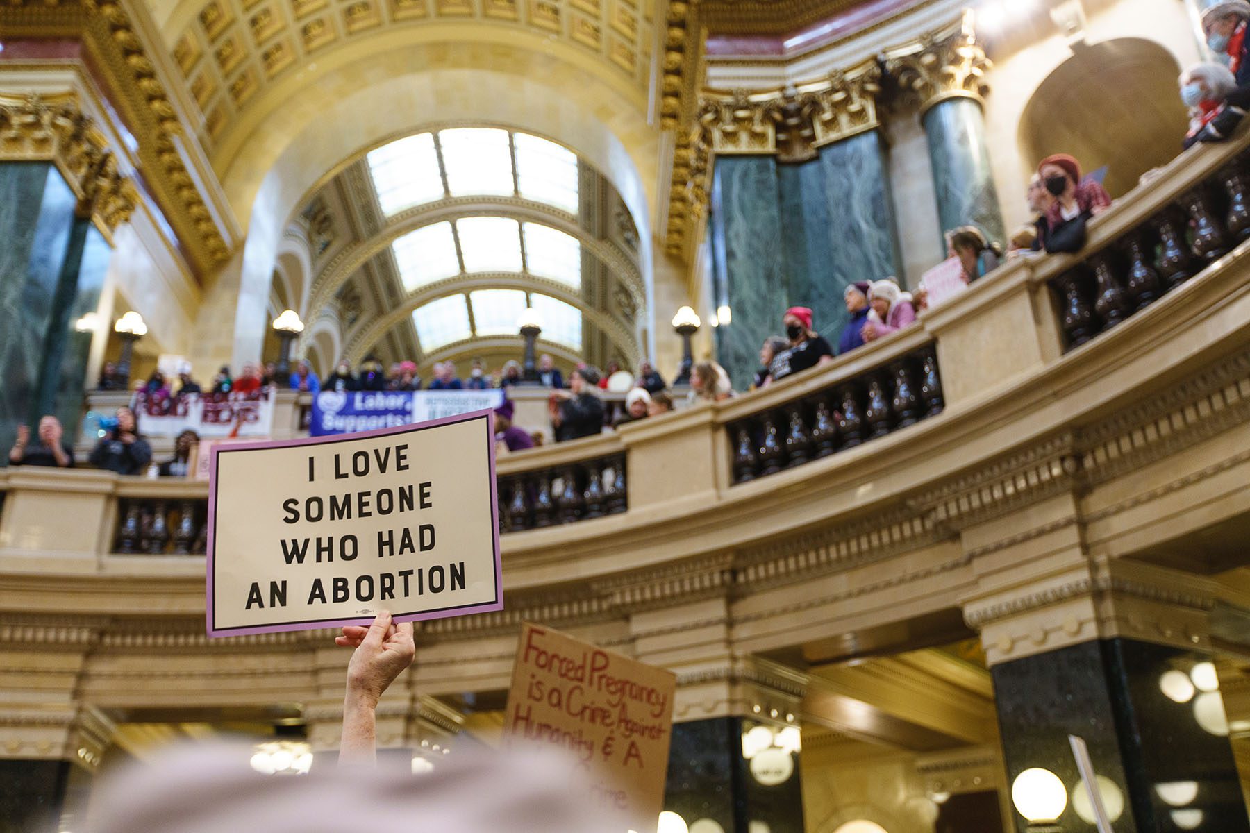 Abortion rights supporters rally at the Bigger Than Roe National Mobilization March in the rotunda of the Wisconsin State Capitol.