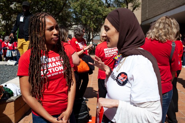 Angela-Ferrell Zabala (left) speaks to a volunteer during an event in Texas in February 2023.