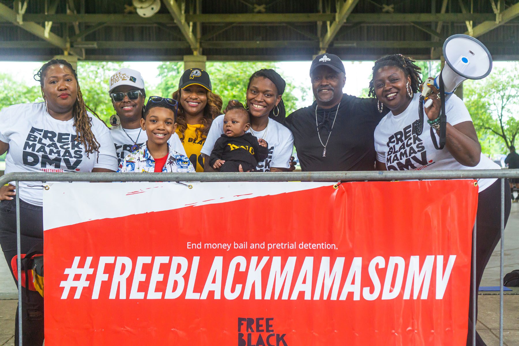 New mom Leara Davis (center) attends a community party hosted by the Free Black Mamas DMV coalition.