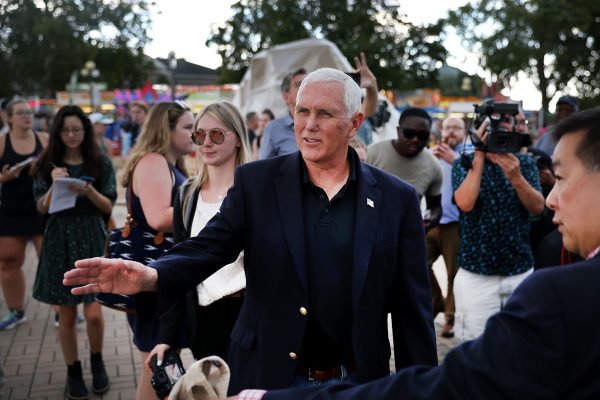 Former Vice President Mike Pence tours the Iowa State Fair in Des Moines, Iowa.