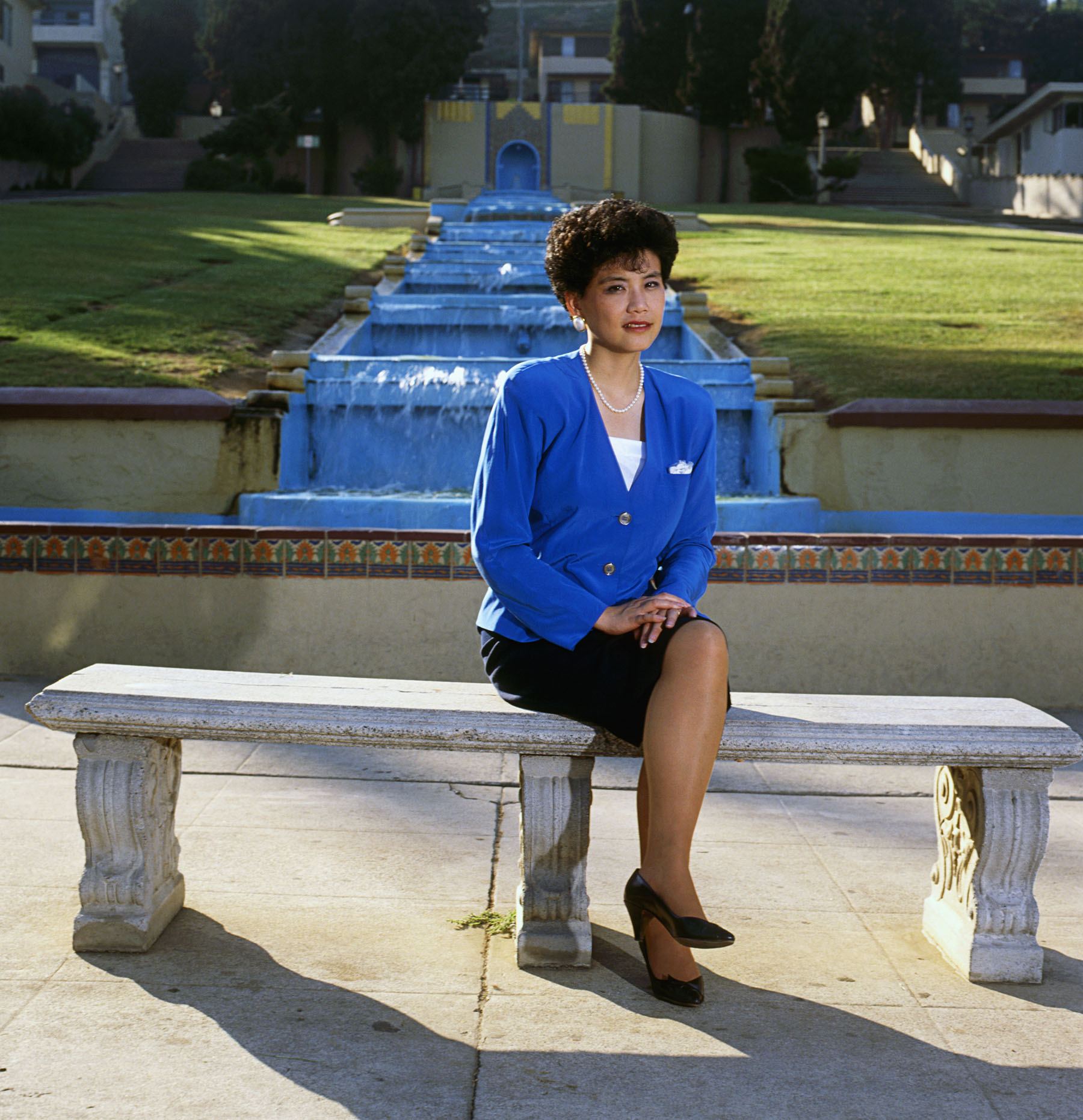 Judy Chu sits on a bench in a park in Chinatown in downtown Los Angeles in September 1990.