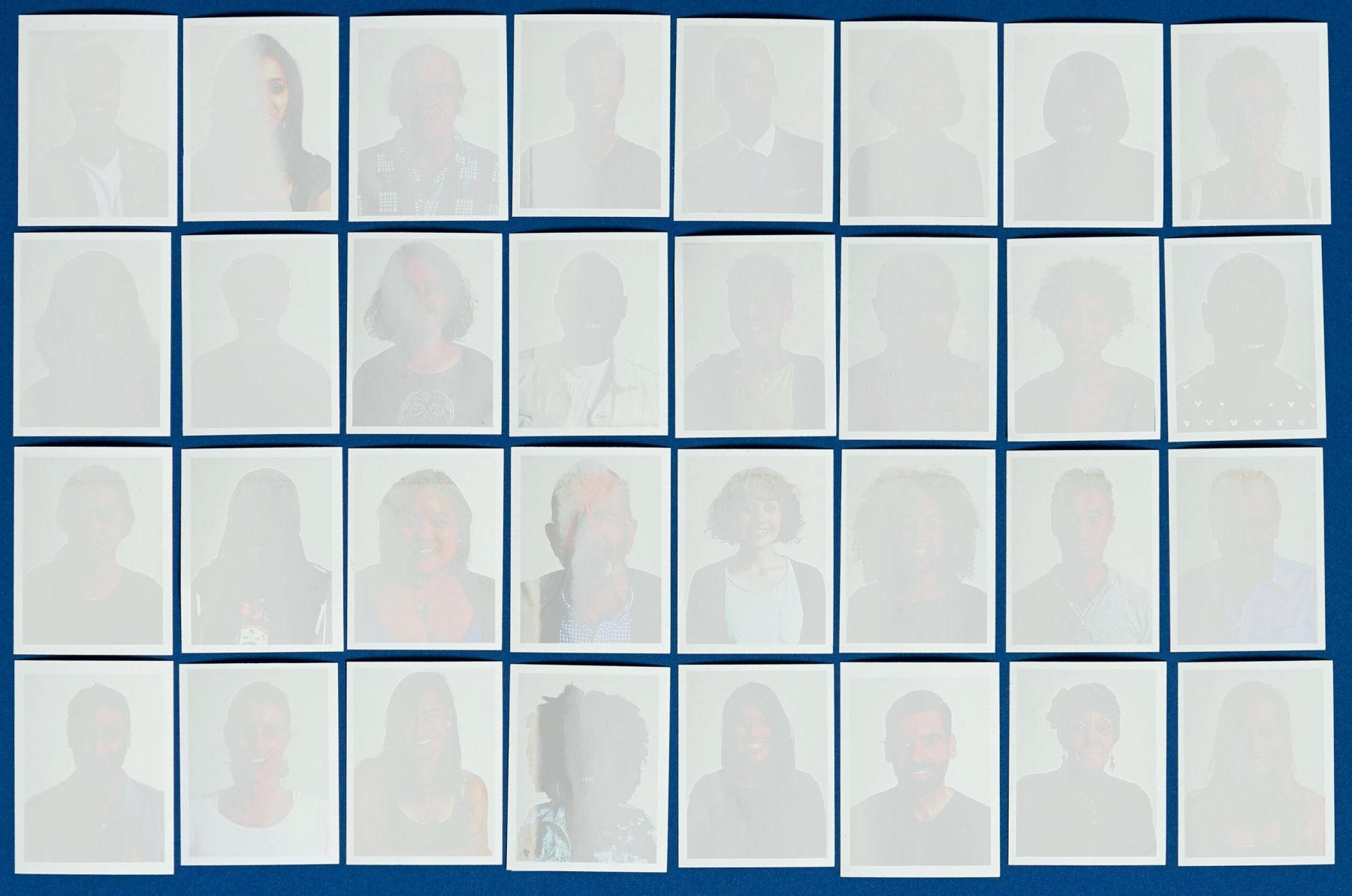 Obscured headshot of multiple people in a grid. The silhouette of the person is visible but not their features.