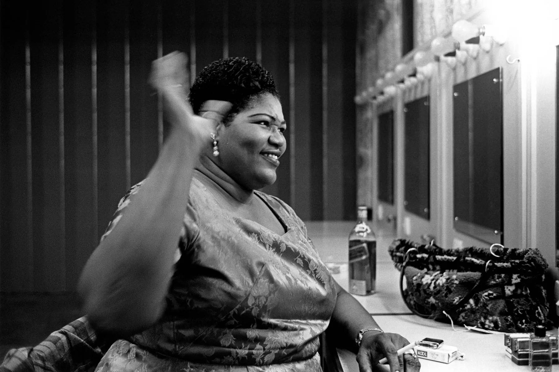 Willie Mae “Big Mama” Thornton smokes in her dressing room.