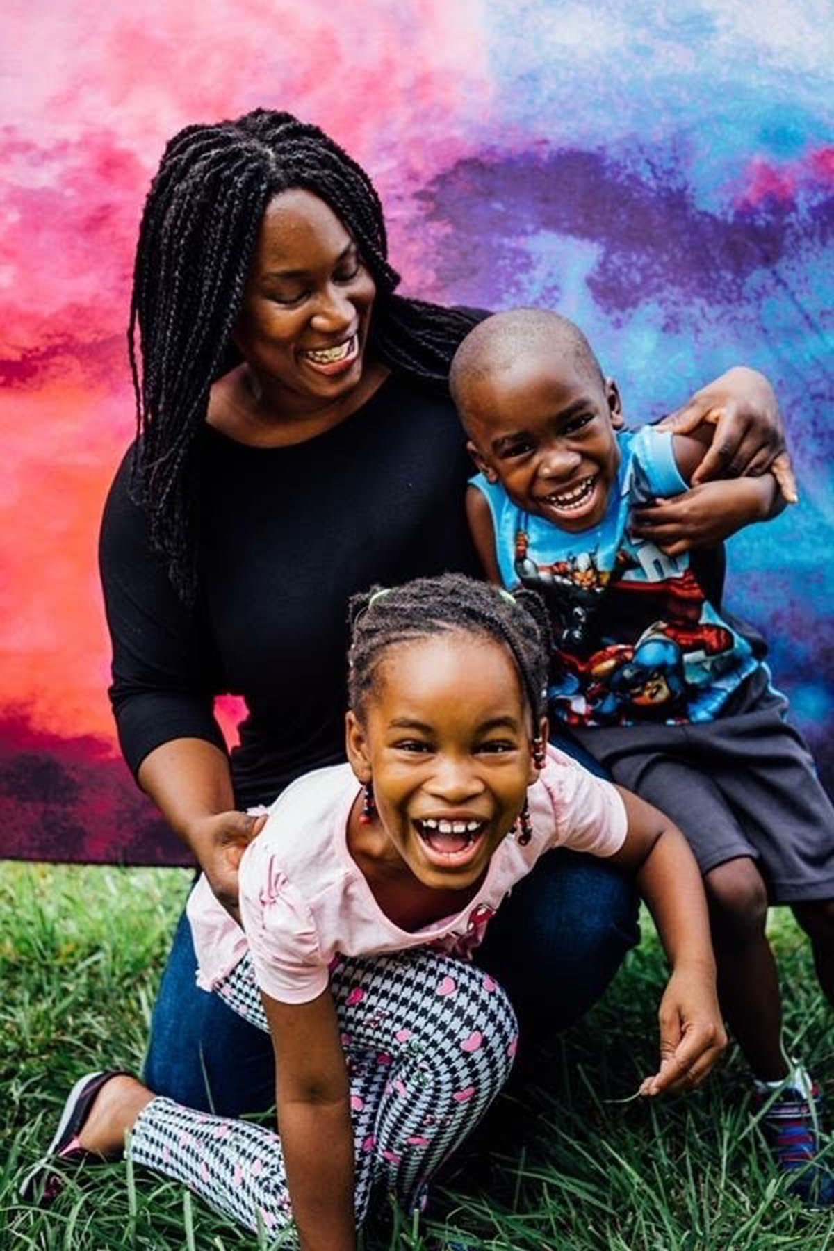 Dr. Onaiwu poses with her two youngest children during a family photoshoot.