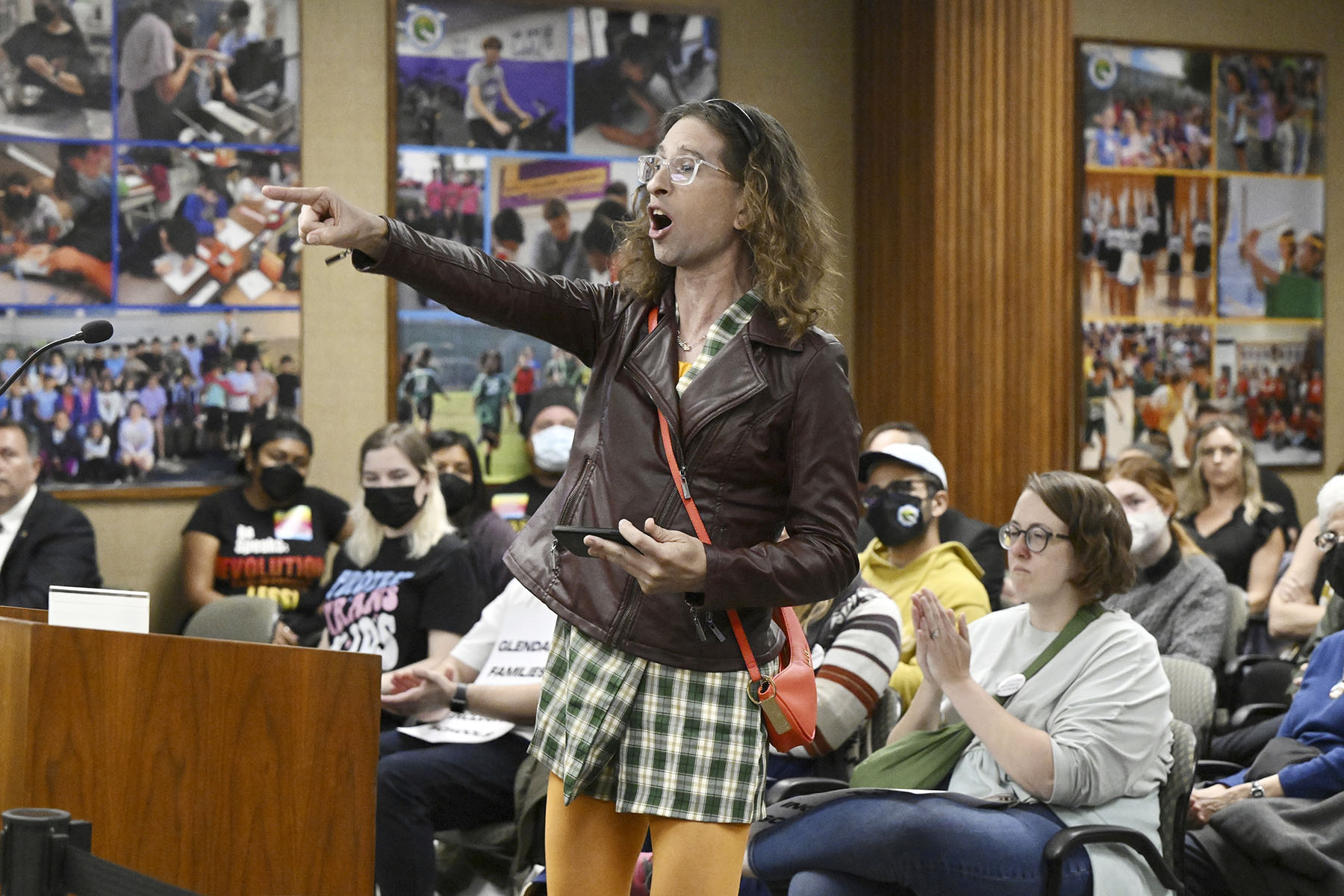 A parent expresses hope that the district continues to teach LGBTQ+ rights in schools at the Glendale Unified School District headquarters.