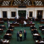 Texas state senators are gathered at the State Capitol in Austin, Texas.