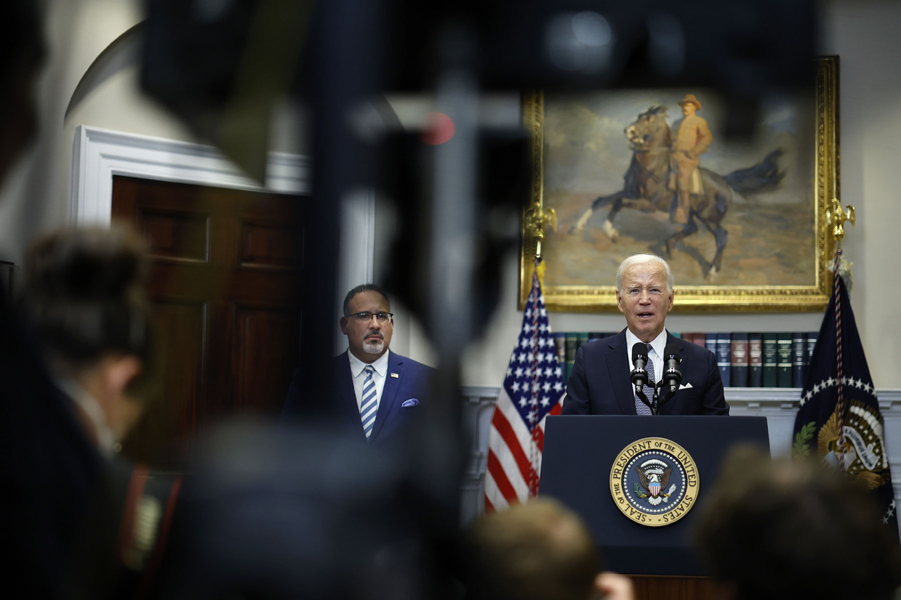 President Biden is joined by Education Secretary Miguel Cardona as he announces new actions to protect borrowers at the White House.