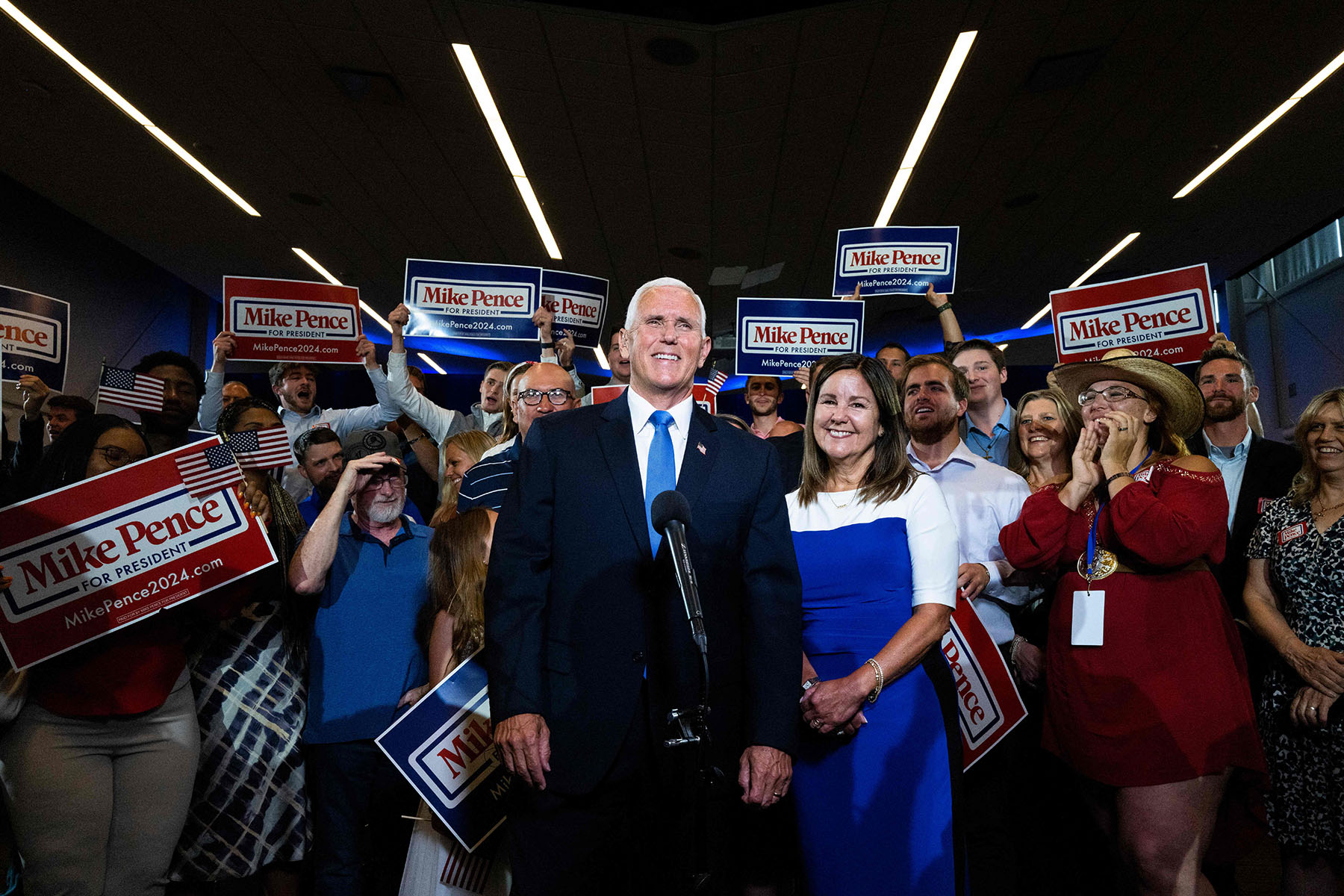 Mike and Karen Pence pose for pictures following Mike Pence's campaign launch event in Ankeny, Iowa, in June 2023.