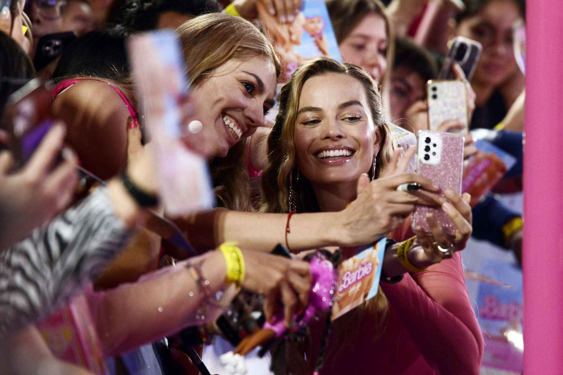 Margot Robbie takes selfies with fans at the Mexico City Barbie movie premiere.