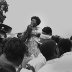 Fannie Lou Hamer speaks to Mississippi Freedom Democratic Party sympathizers outside the Capitol.